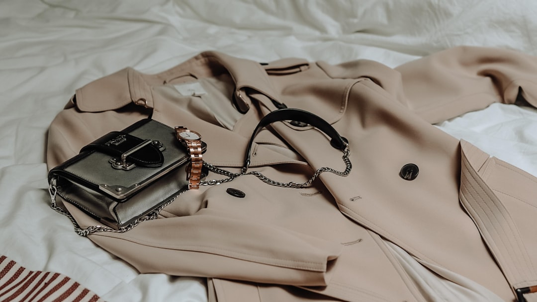 Woman selecting outfit pieces from a curated wardrobe