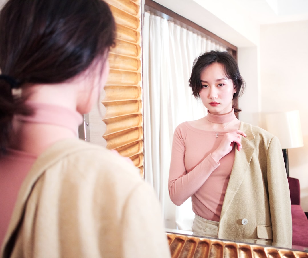 Woman choosing outfit pieces reflecting personal style